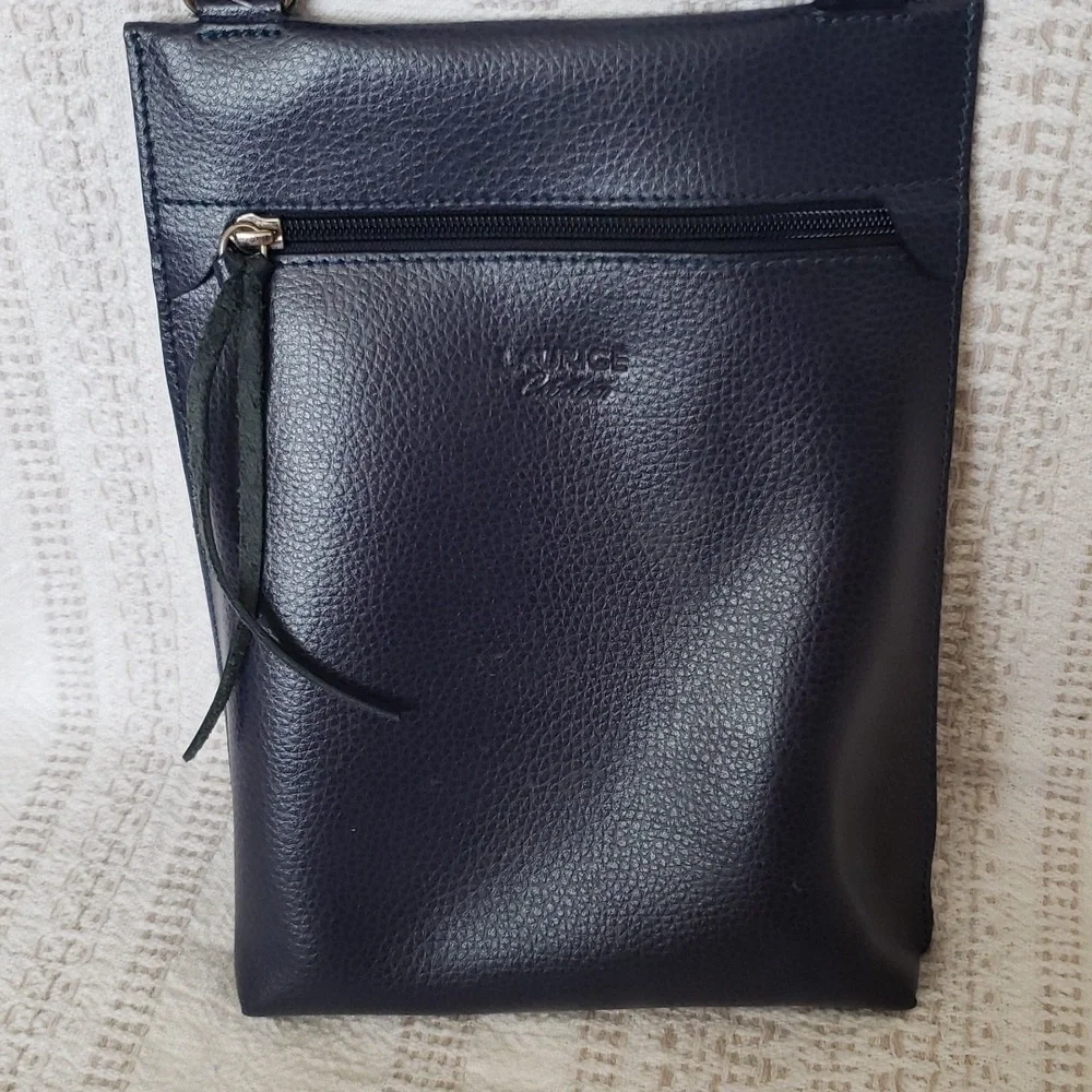 Laurige Criateru purple genuine Leather crossbody purse. Silver hardware.